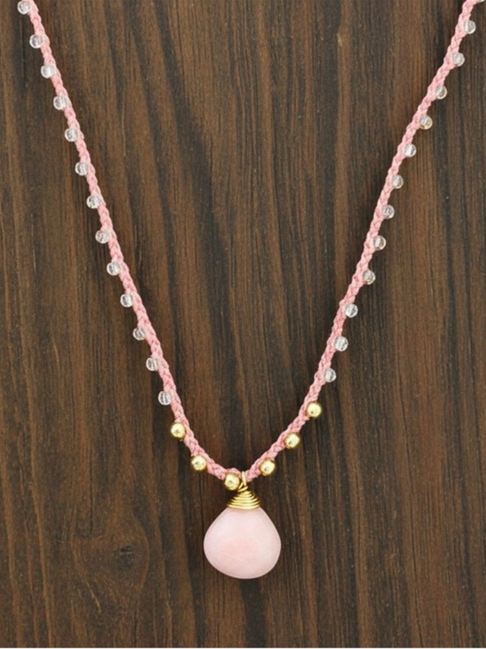 Pink silk thread necklace with a beautiful coral briolette gemstone